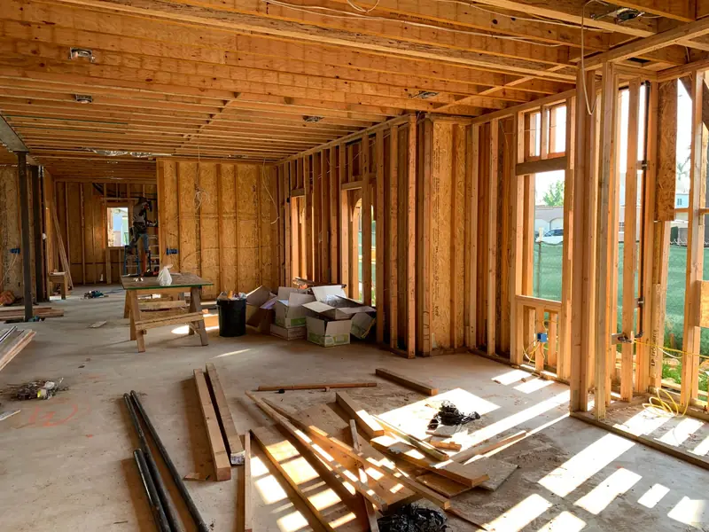 Timber wall and roof framing going up on an extension